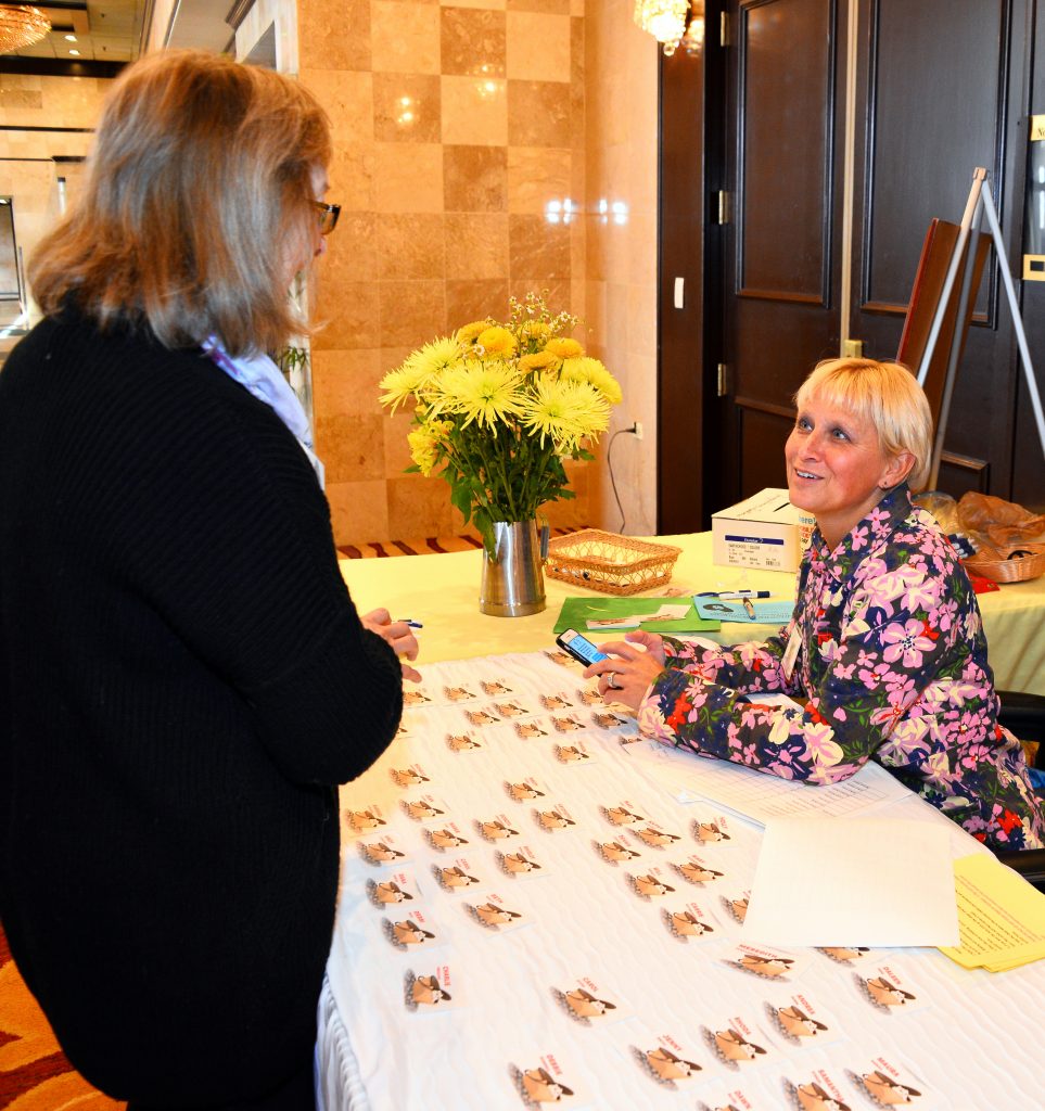 Touched By An Animal Registration Table for Books and Baskets Benefit Brunch 2018.